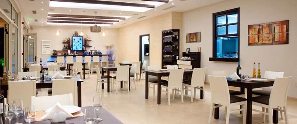 Delfini Beach Hotel & Suites Archangelos  Esterno foto
